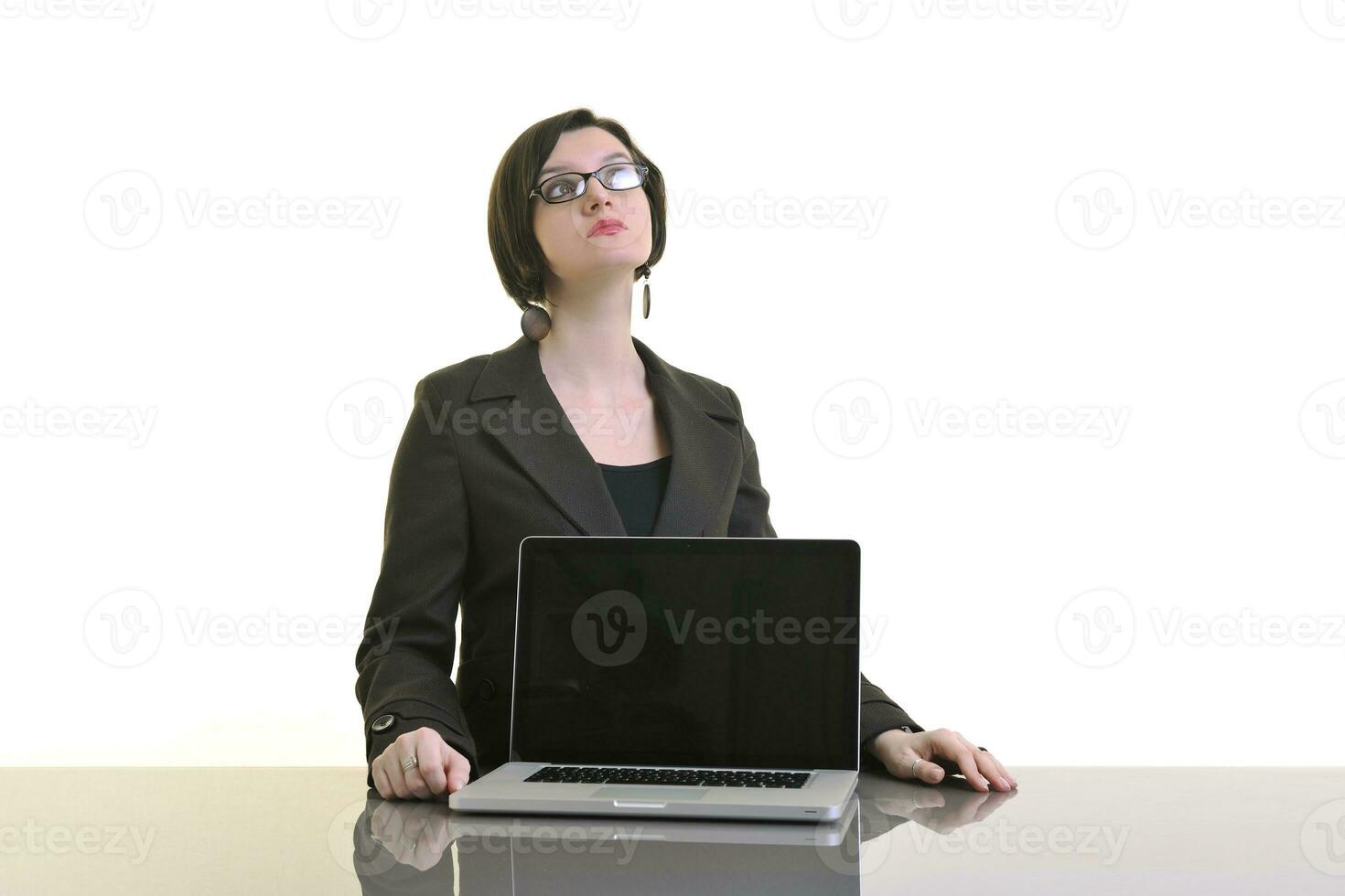 business woman working on laptop isolated on white photo