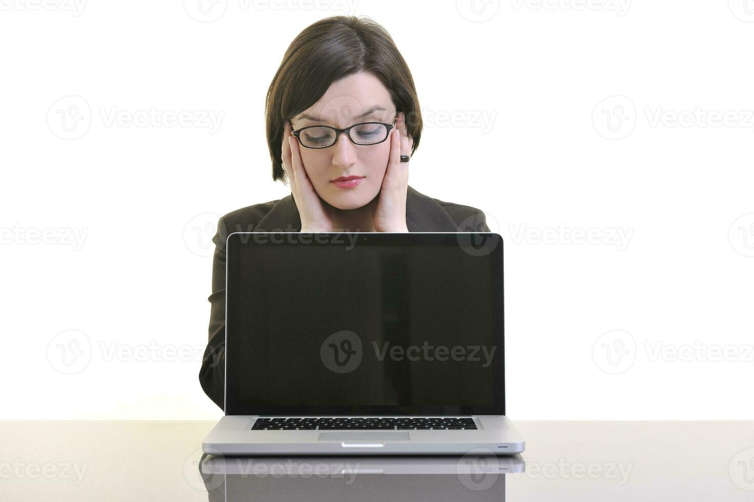 business woman working on laptop isolated on white photo