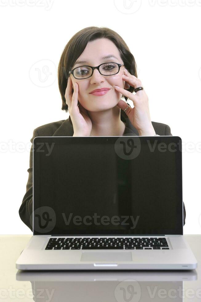 business woman working on laptop isolated on white photo