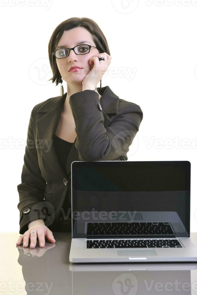 business woman working on laptop isolated on white photo