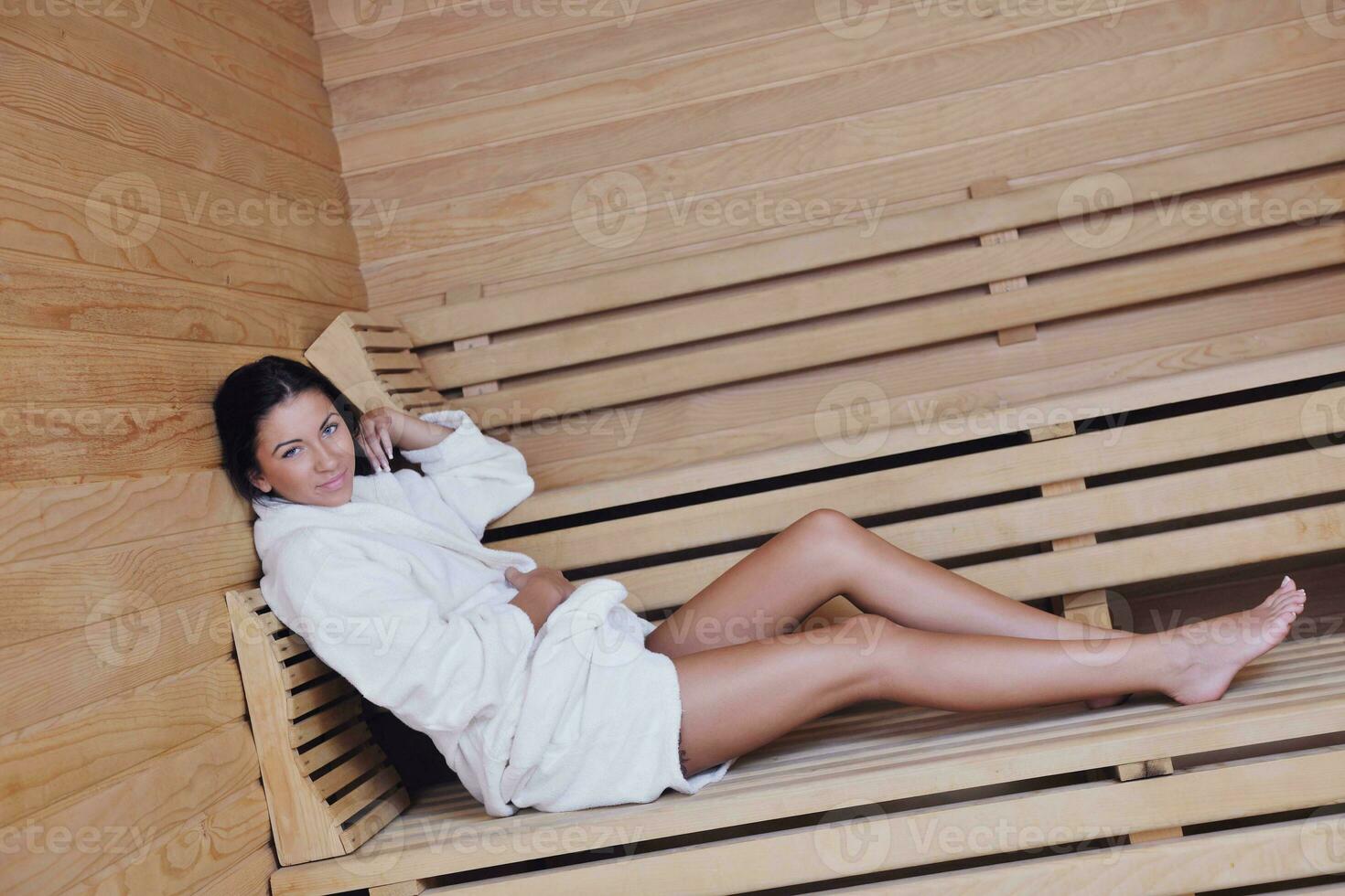 Young woman take a steam bath photo