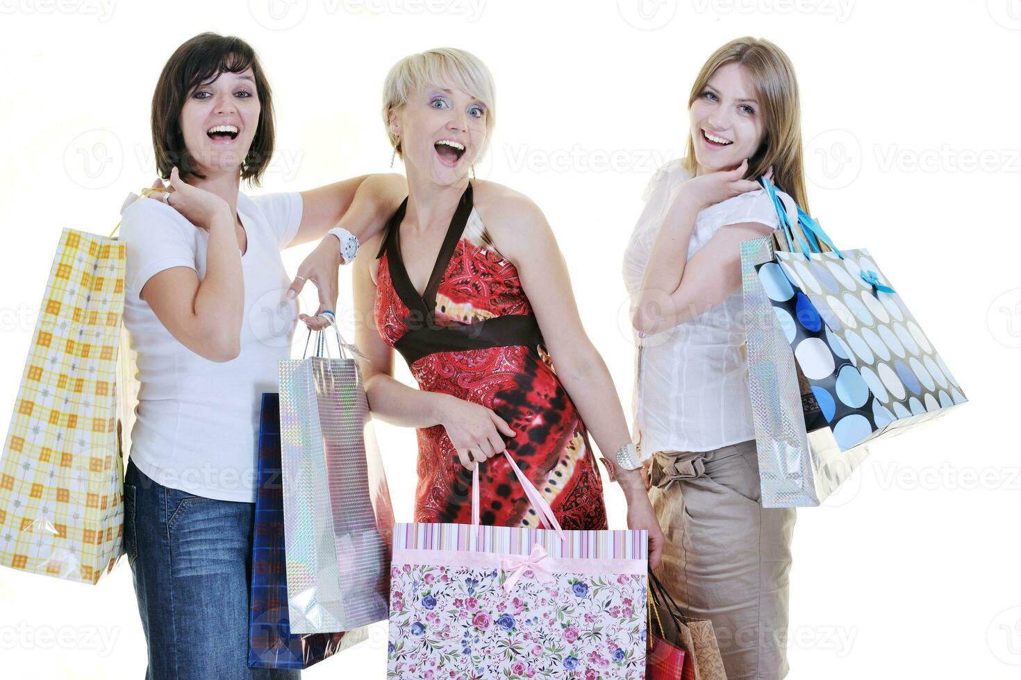 happy young adult women  shopping with colored bags photo