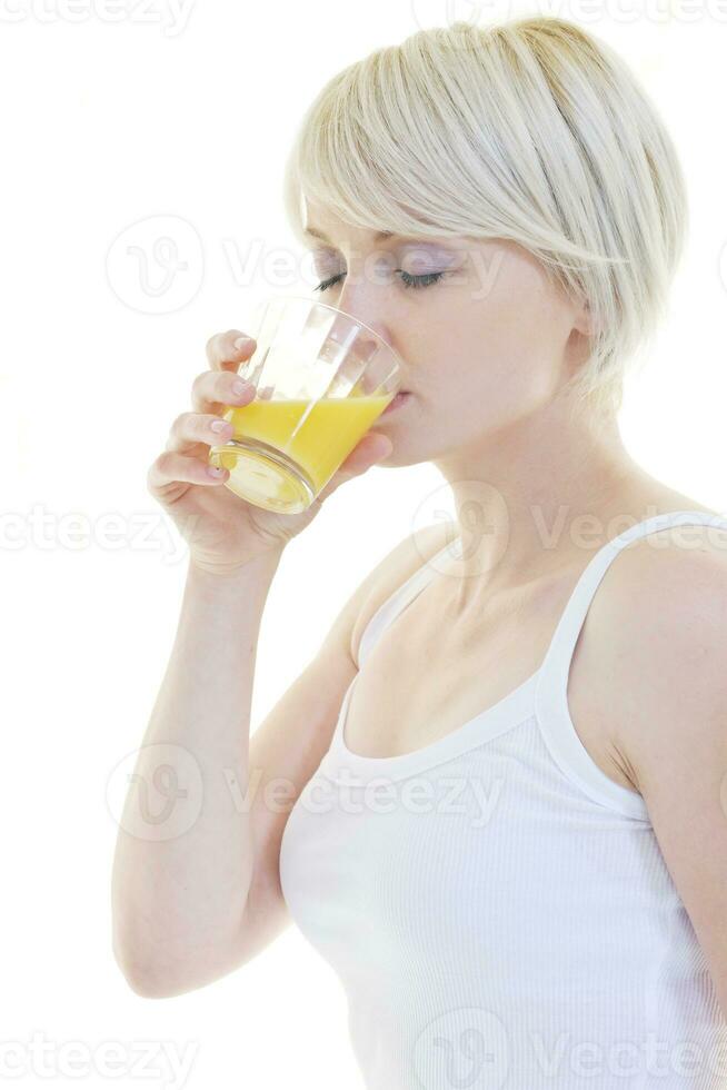 Young woman squeeze orange juice photo