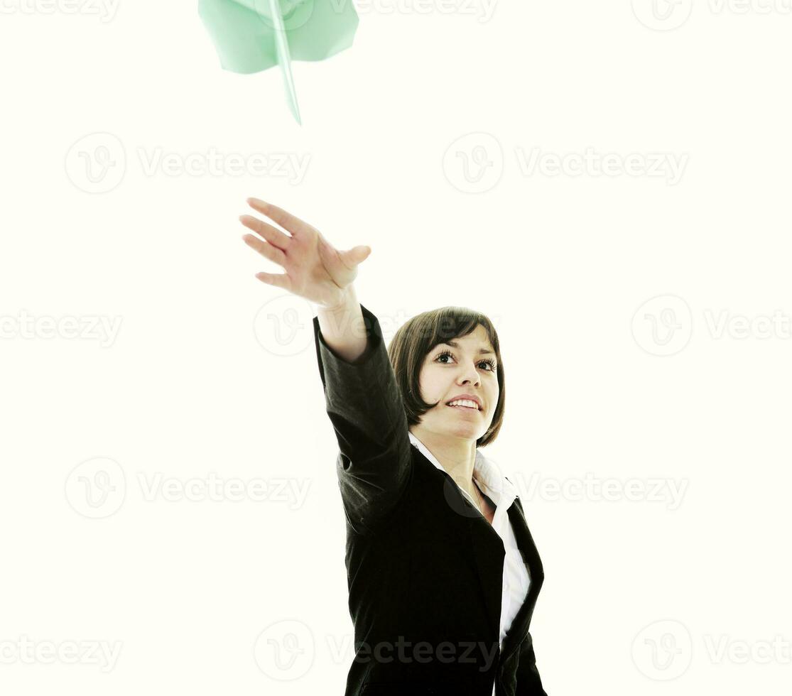 business woman throwing  paper airplane photo