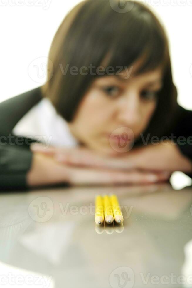bosiness woman choosing perfect pencil photo