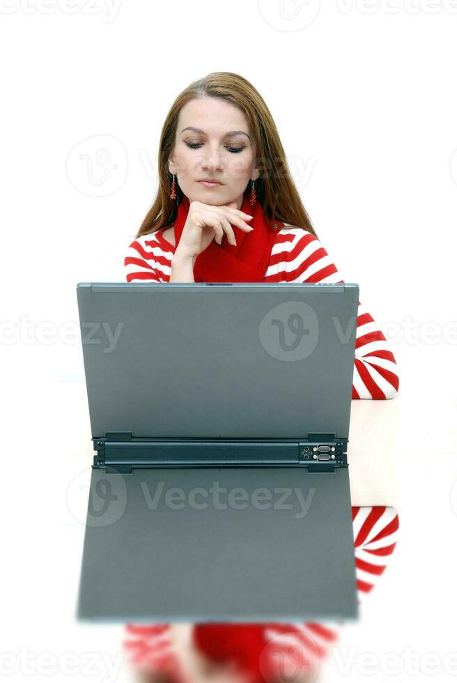 businesswoman  in red with reflection... photo