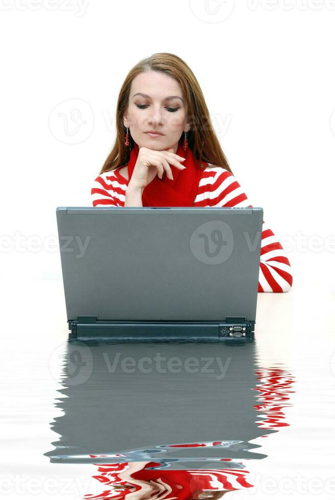 businesswoman  in red with reflection... photo