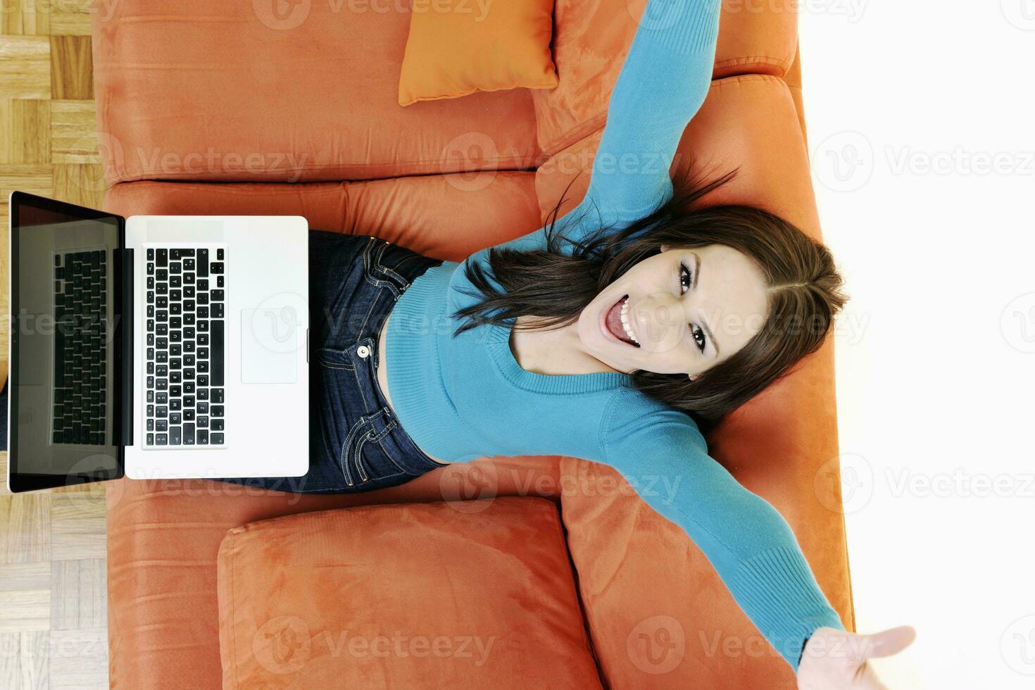 one young woman working on laptop photo