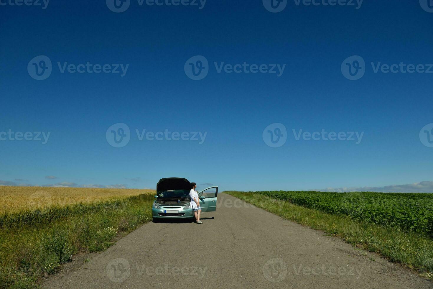 woman with broken car photo