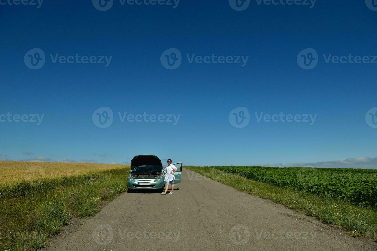 woman with broken car photo