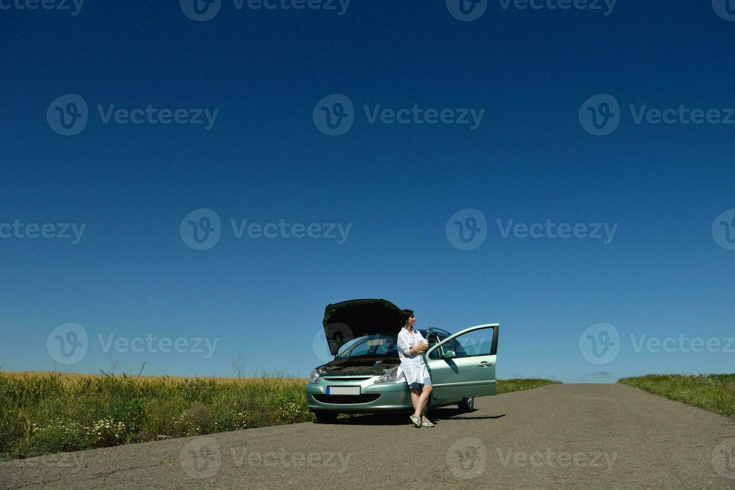 woman with broken car photo