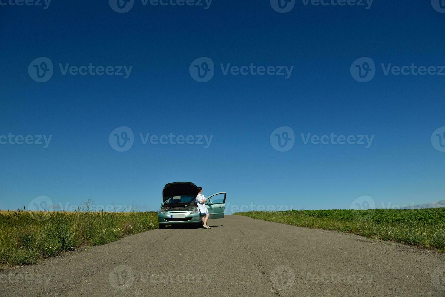 woman with broken car photo