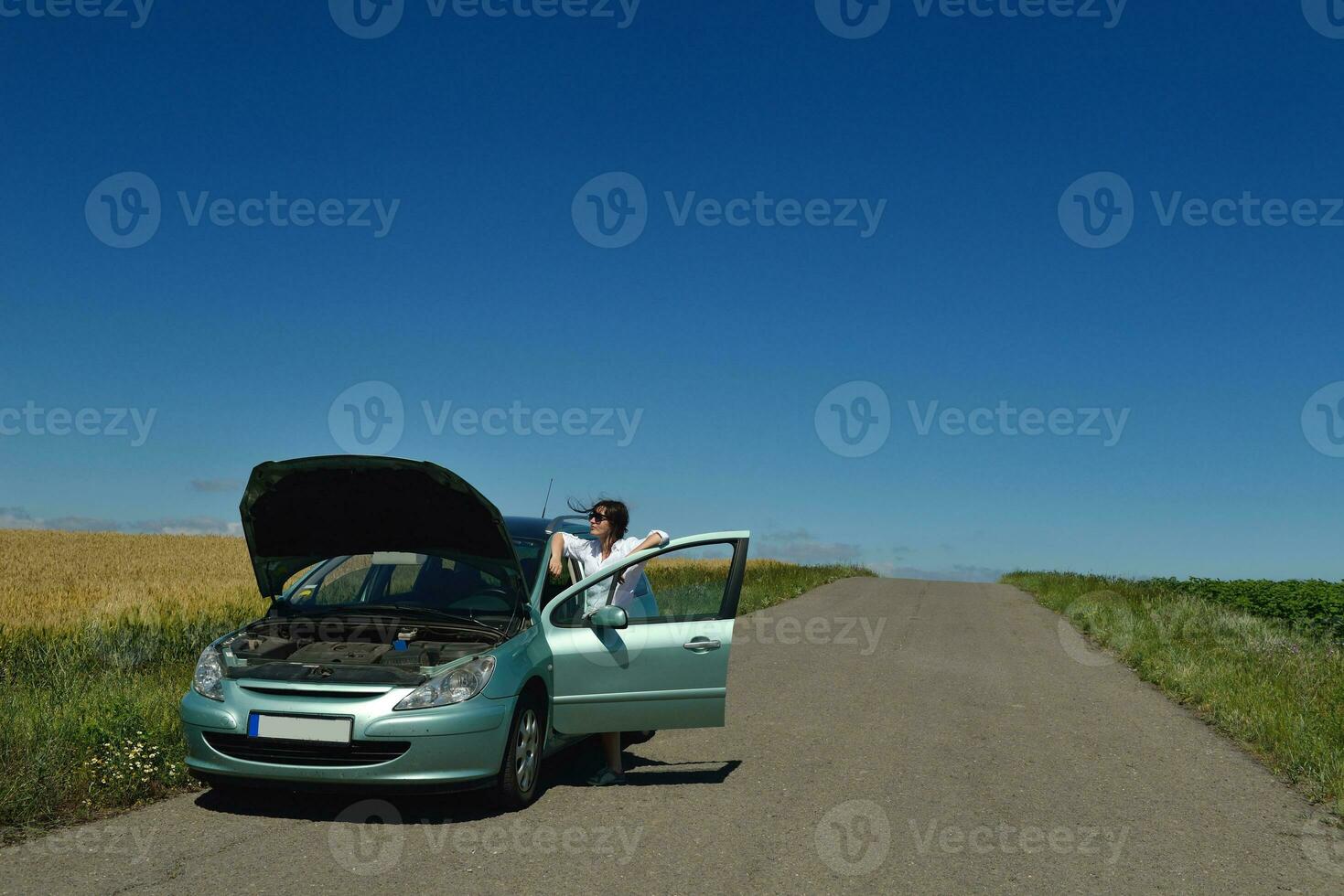 woman with broken car photo