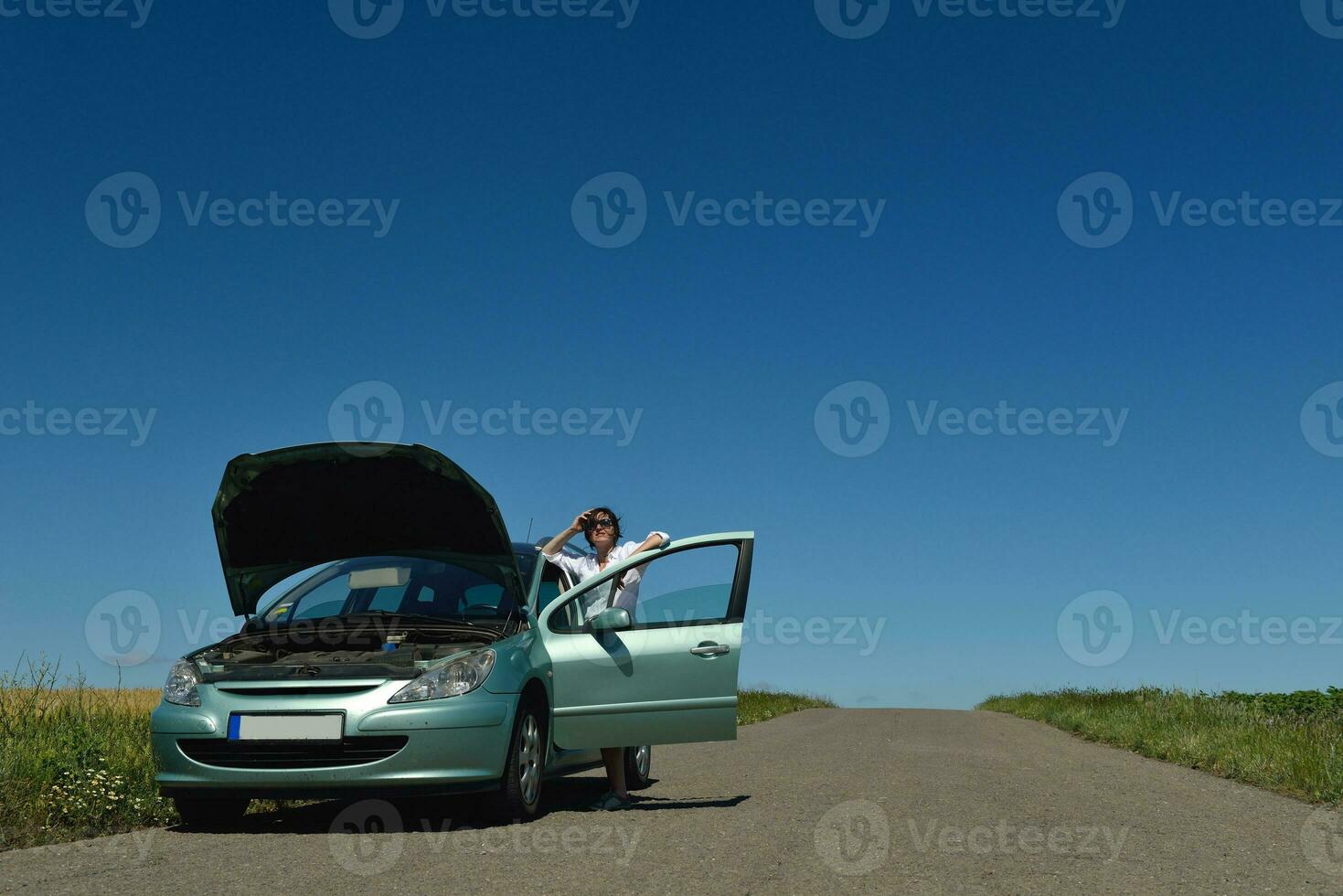 woman with broken car photo