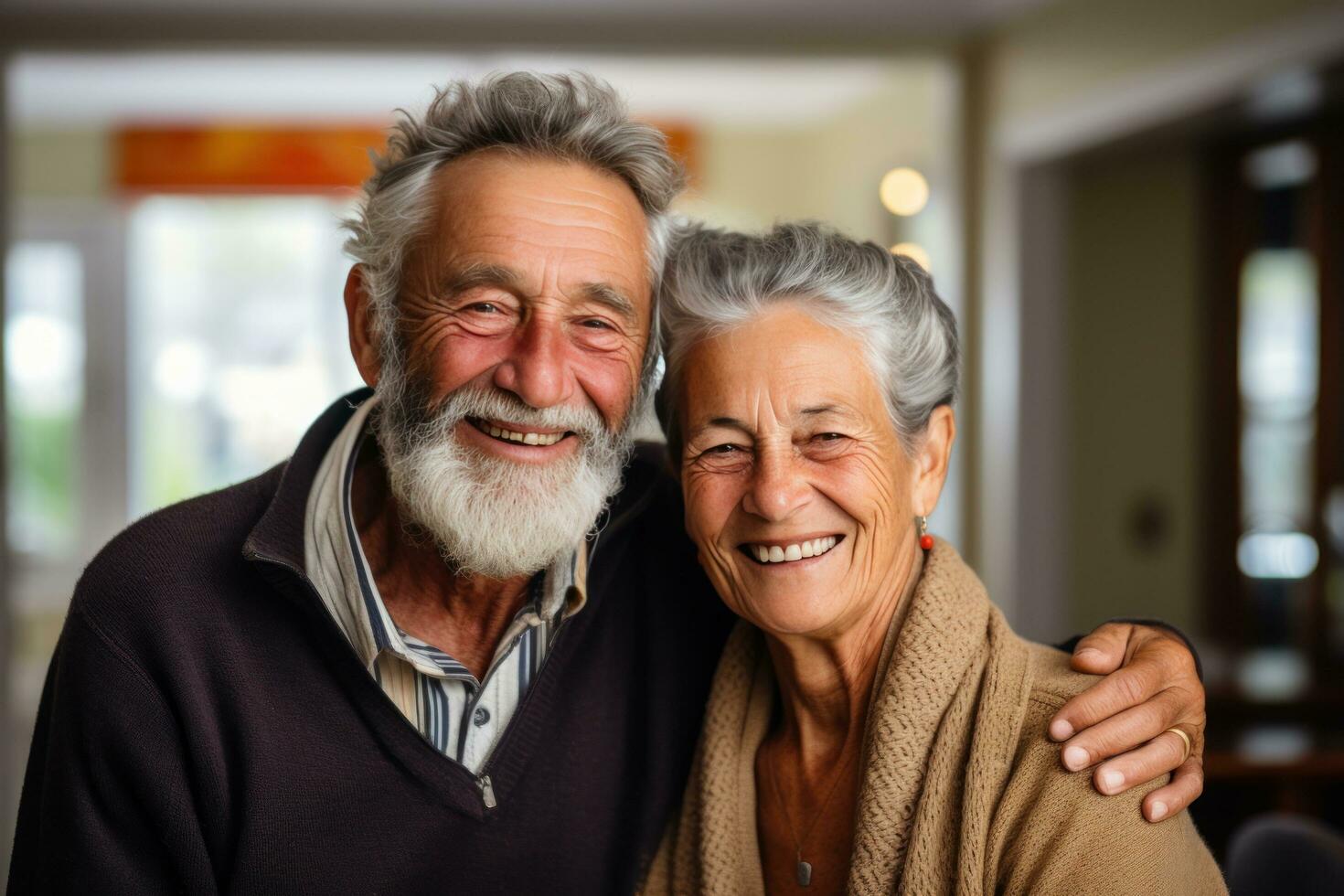 an older couple embracing in a kitchen photo