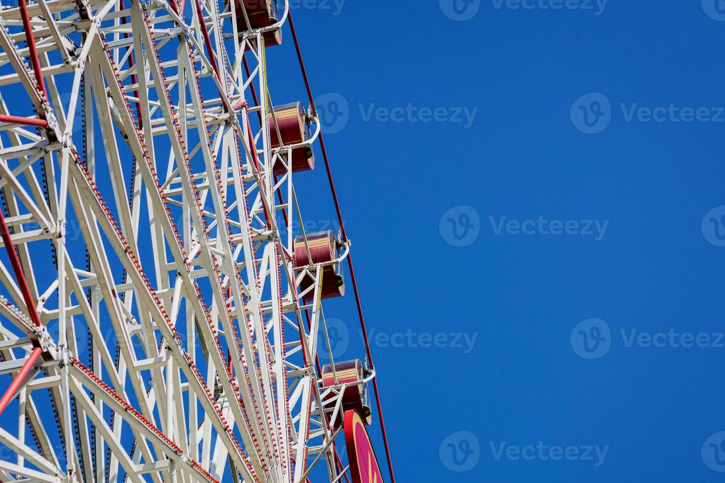 Ferris wheel on blue sky photo