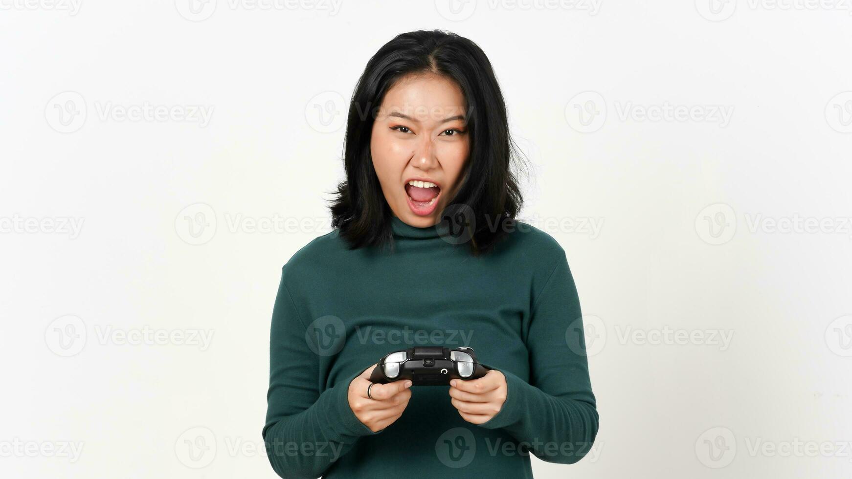 Angry woman playing online video games with joystick. Gamer using