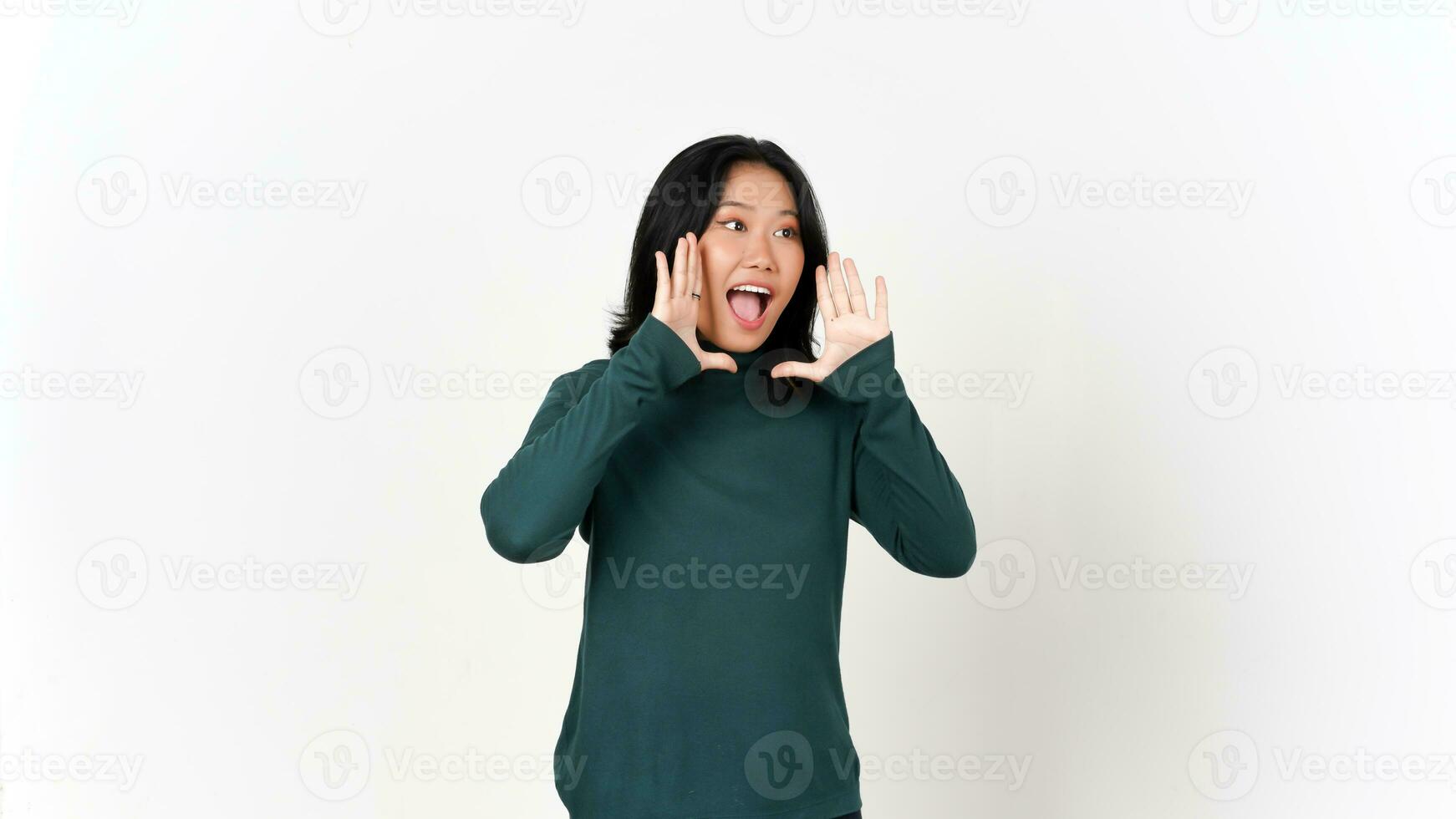Announcement Shout with hands over mouth Of Beautiful Asian Woman Isolated On White Background photo