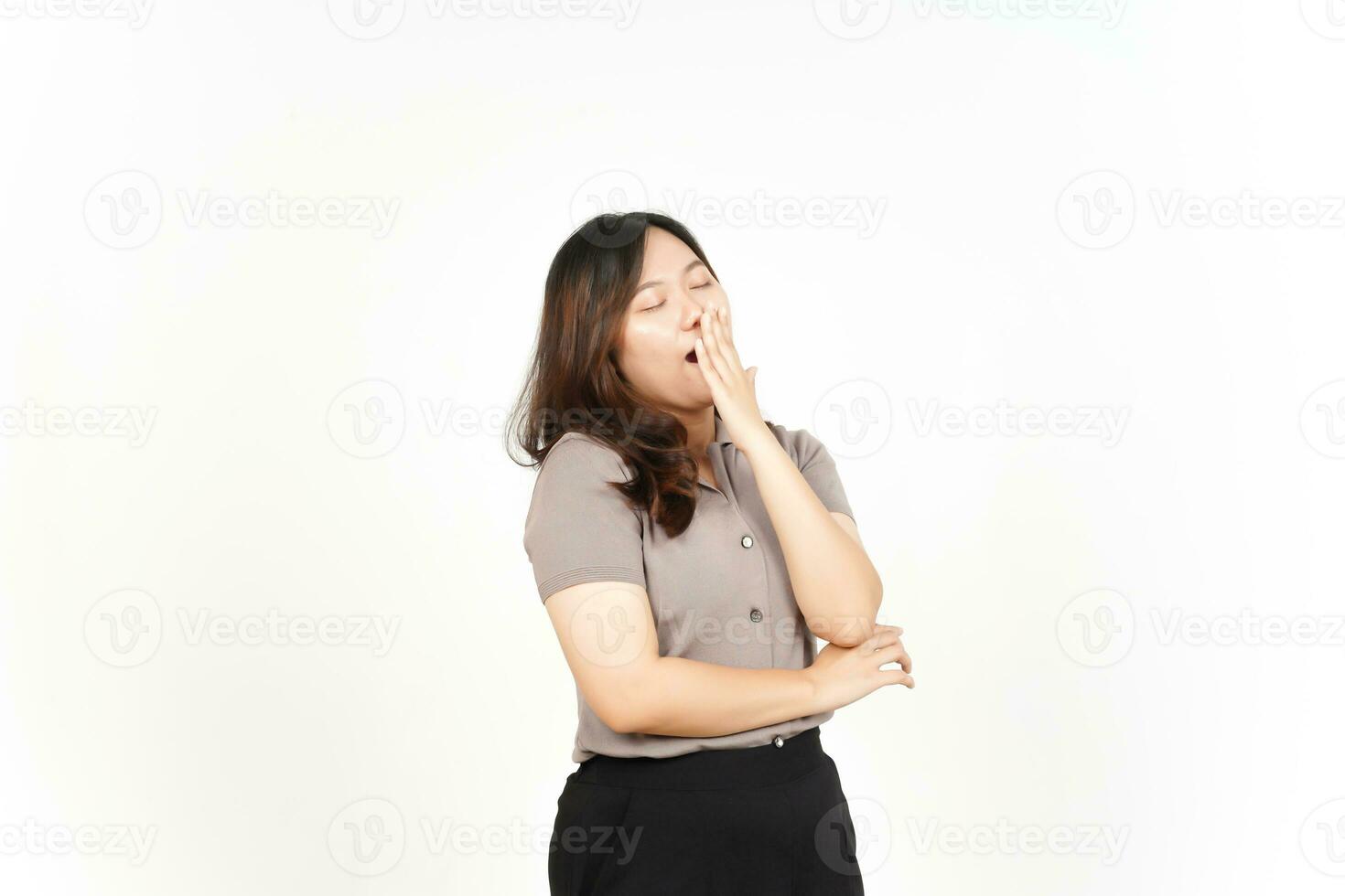 Yawning Gesture Of Beautiful Asian Woman Isolated On White Background photo
