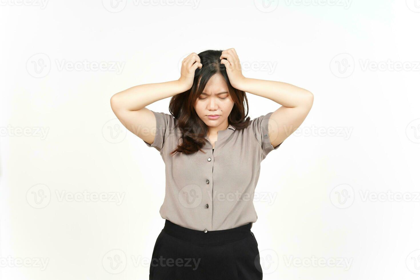 Suffering Headache Gesture Of Beautiful Asian Woman Isolated On White Background photo