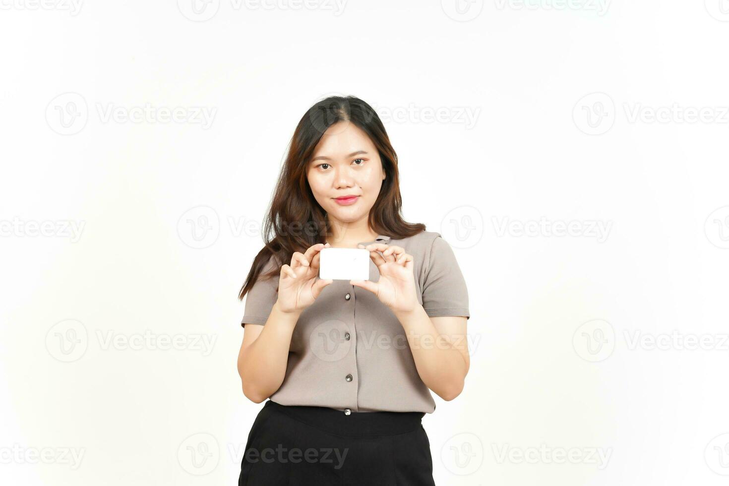 Holding and Showing Blank Credit Card Of Beautiful Asian Woman Isolated On White Background photo