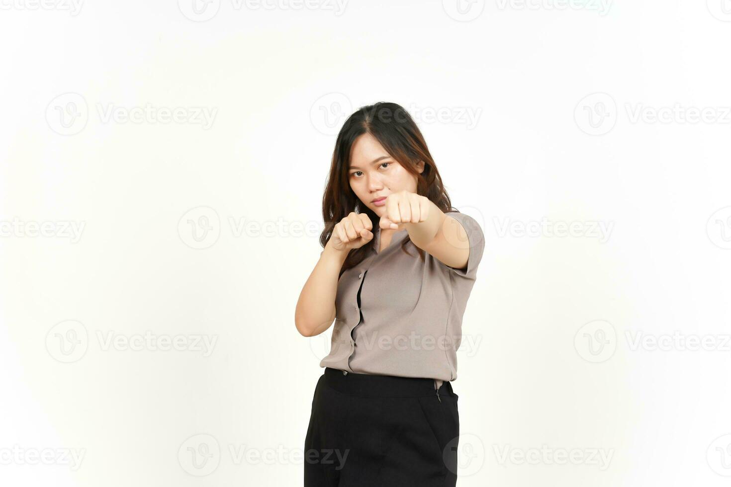 Punching fist to fight Of Beautiful Asian Woman Isolated On White Background photo