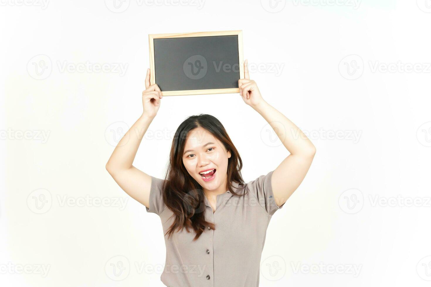 Showing, Presenting and holding Blank Blackboard Of Beautiful Asian Woman Isolated On White photo