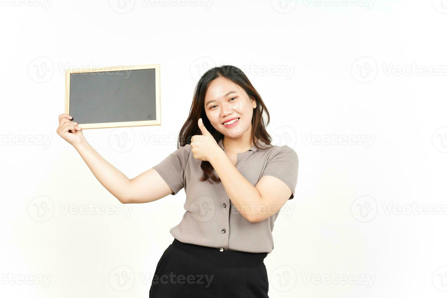 Showing, Presenting and holding Blank Blackboard Of Beautiful Asian Woman Isolated On White photo