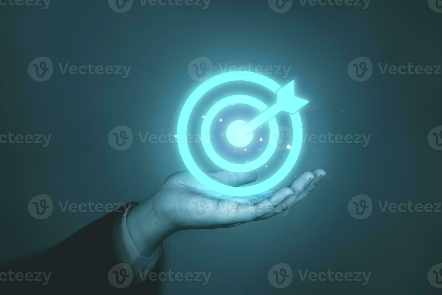 Businessman's holding a target board virtual. concept of target and teamwork to achieve goals. photo