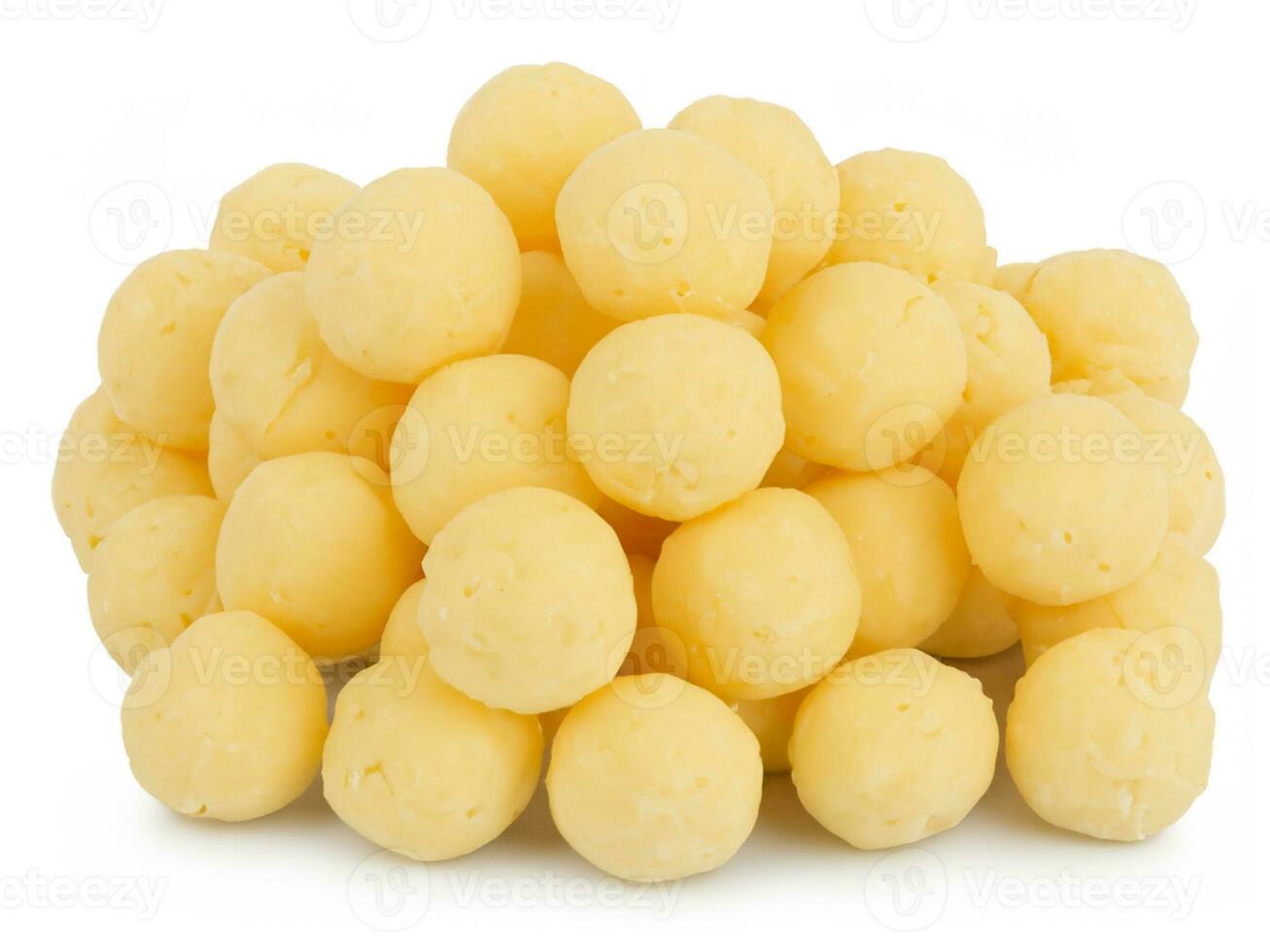 heap of round yellow sweet potato chips with white background photo