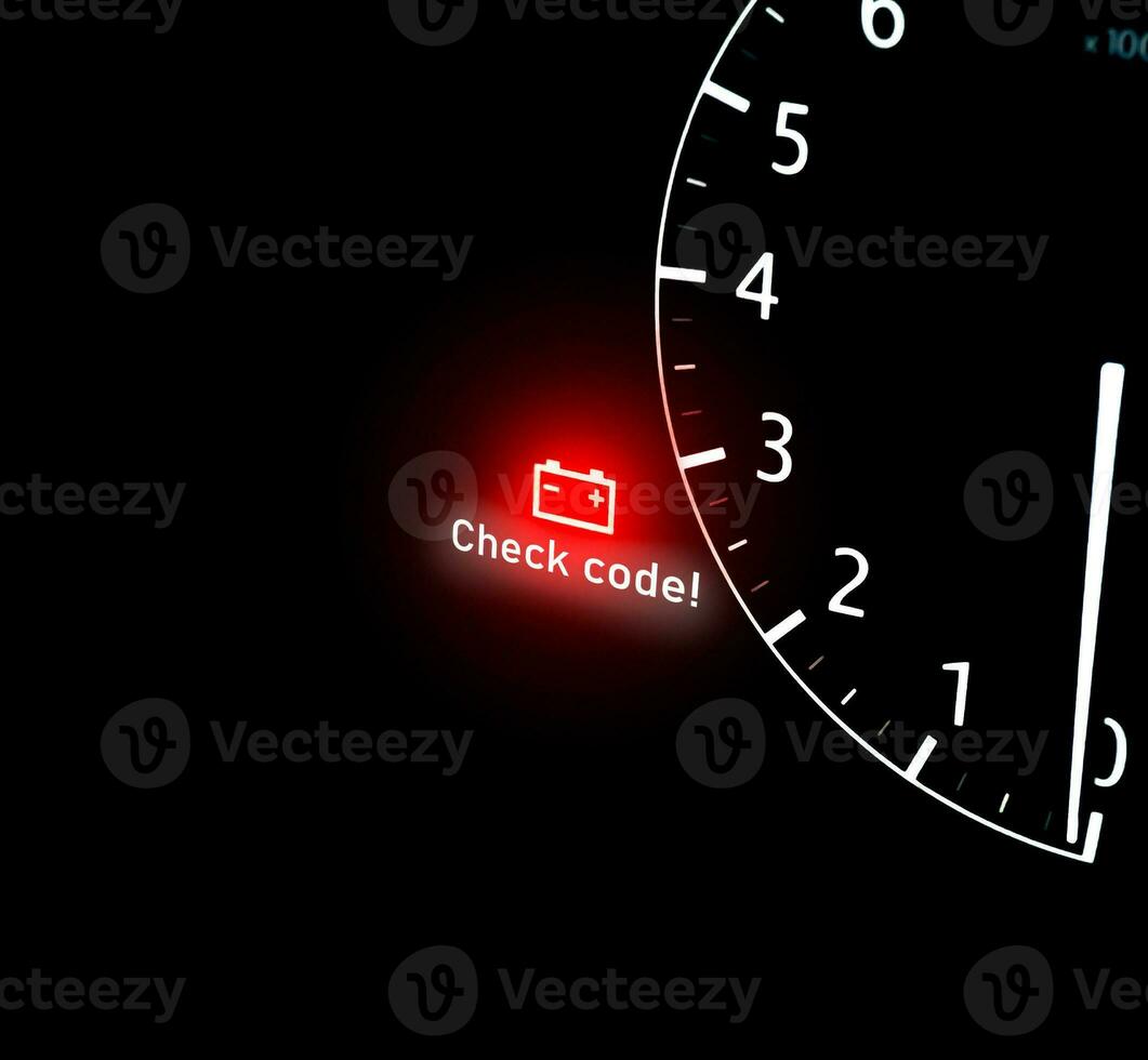 Battery warning light on car dashboard with copy space below on black