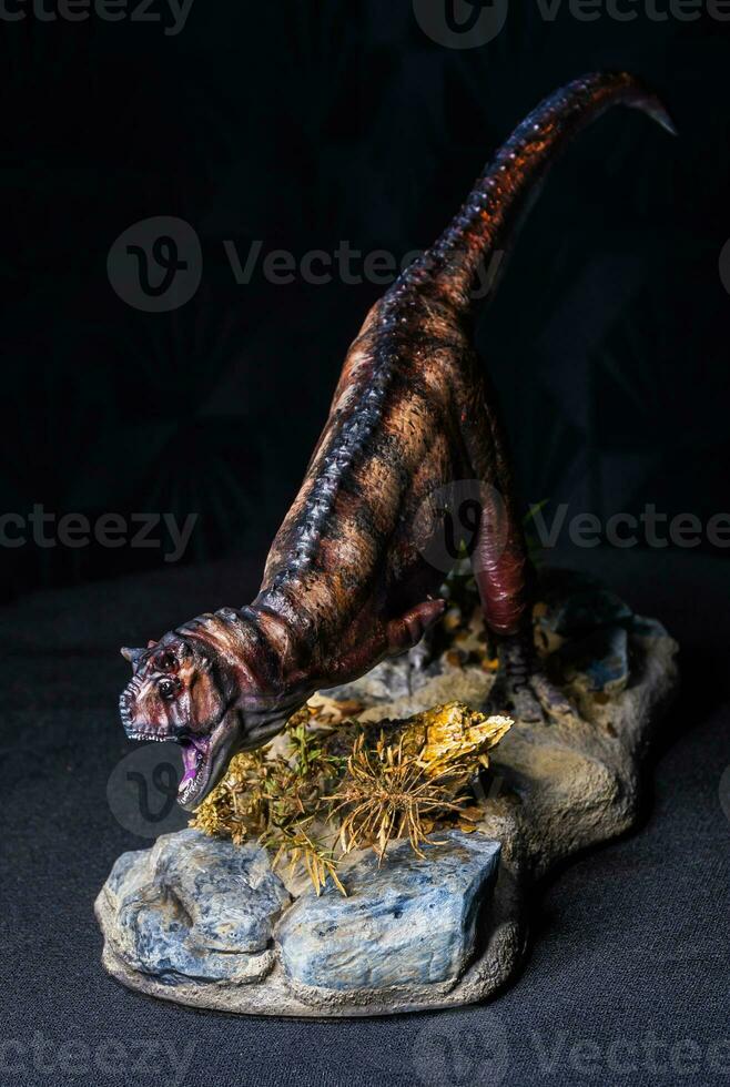 Carnotaurus Dinosaur in the dark 31098511 Stock Photo at Vecteezy