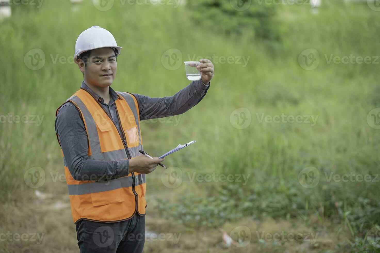 Environmental engineers inspect water quality,Bring water to the lab for testing,Check the mineral content in water and soil,Check for contaminants in water sources. photo