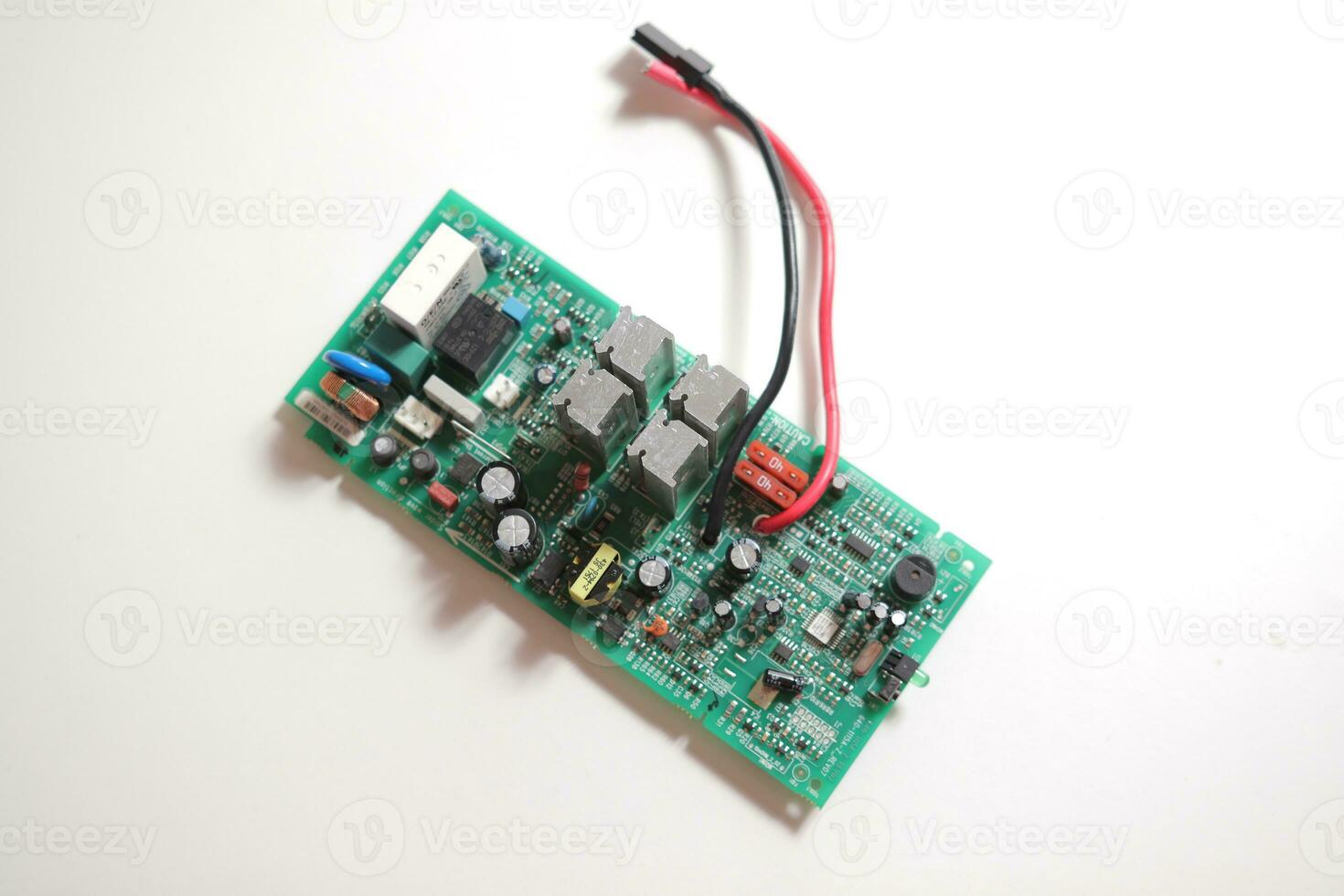 Power Supply modern printed-circuit board with electronic components with transistor. PCB detail photo