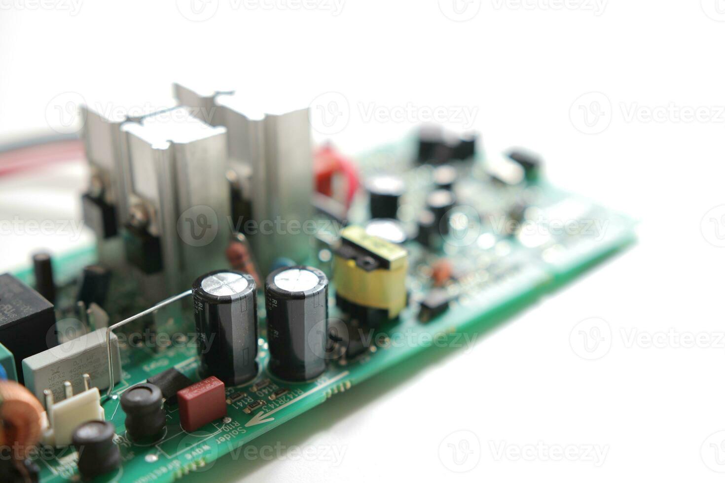 Power Supply modern printed-circuit board with electronic components with transistor. PCB detail photo