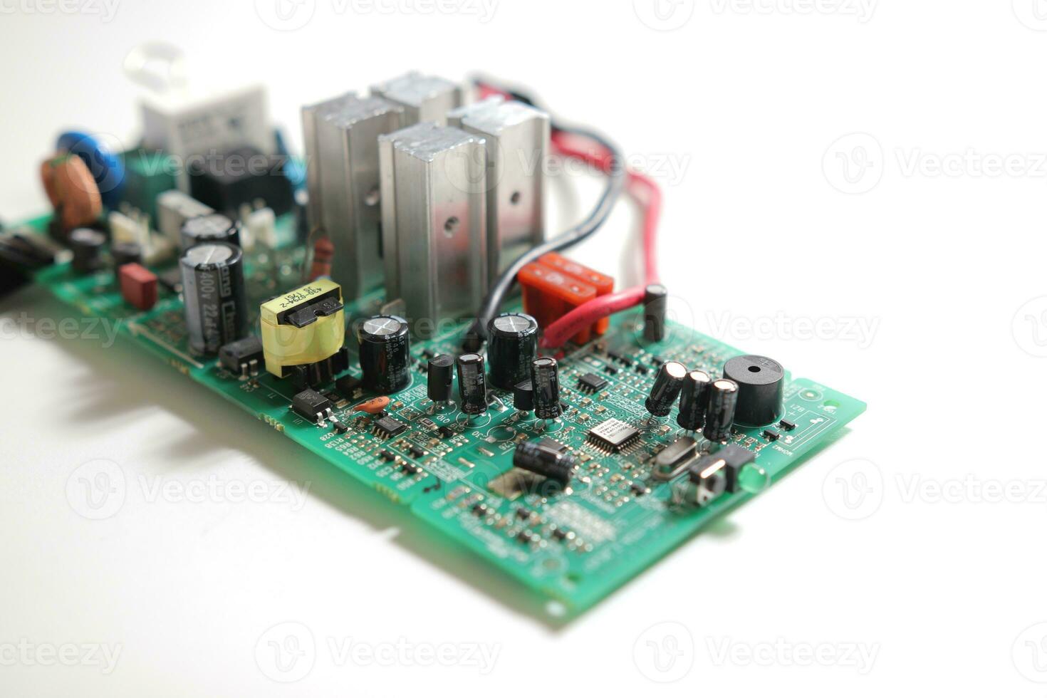 Power Supply modern printed-circuit board with electronic components with transistor. PCB detail photo