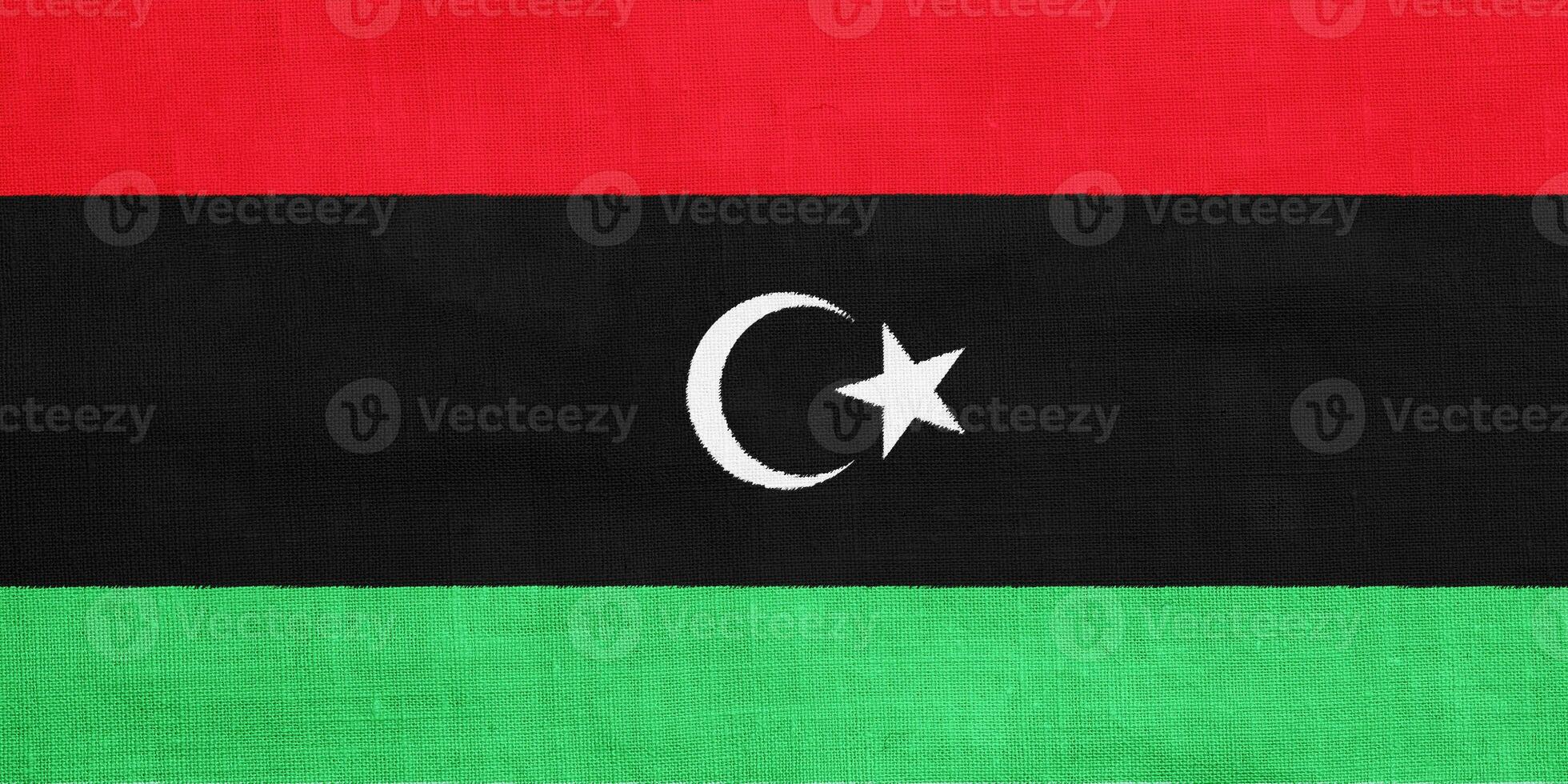 Flag of State of Libya on a textured background. Concept collage. photo