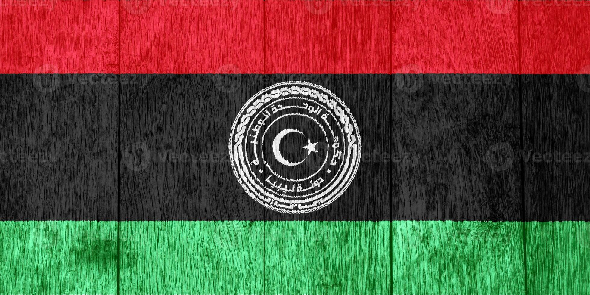 Flag and coat of arms of State of Libya on a textured background. Concept collage. photo