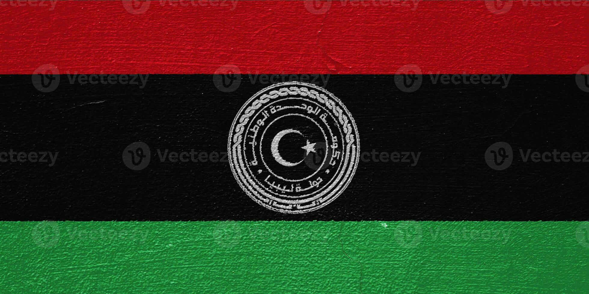 Flag and coat of arms of State of Libya on a textured background. Concept collage. photo