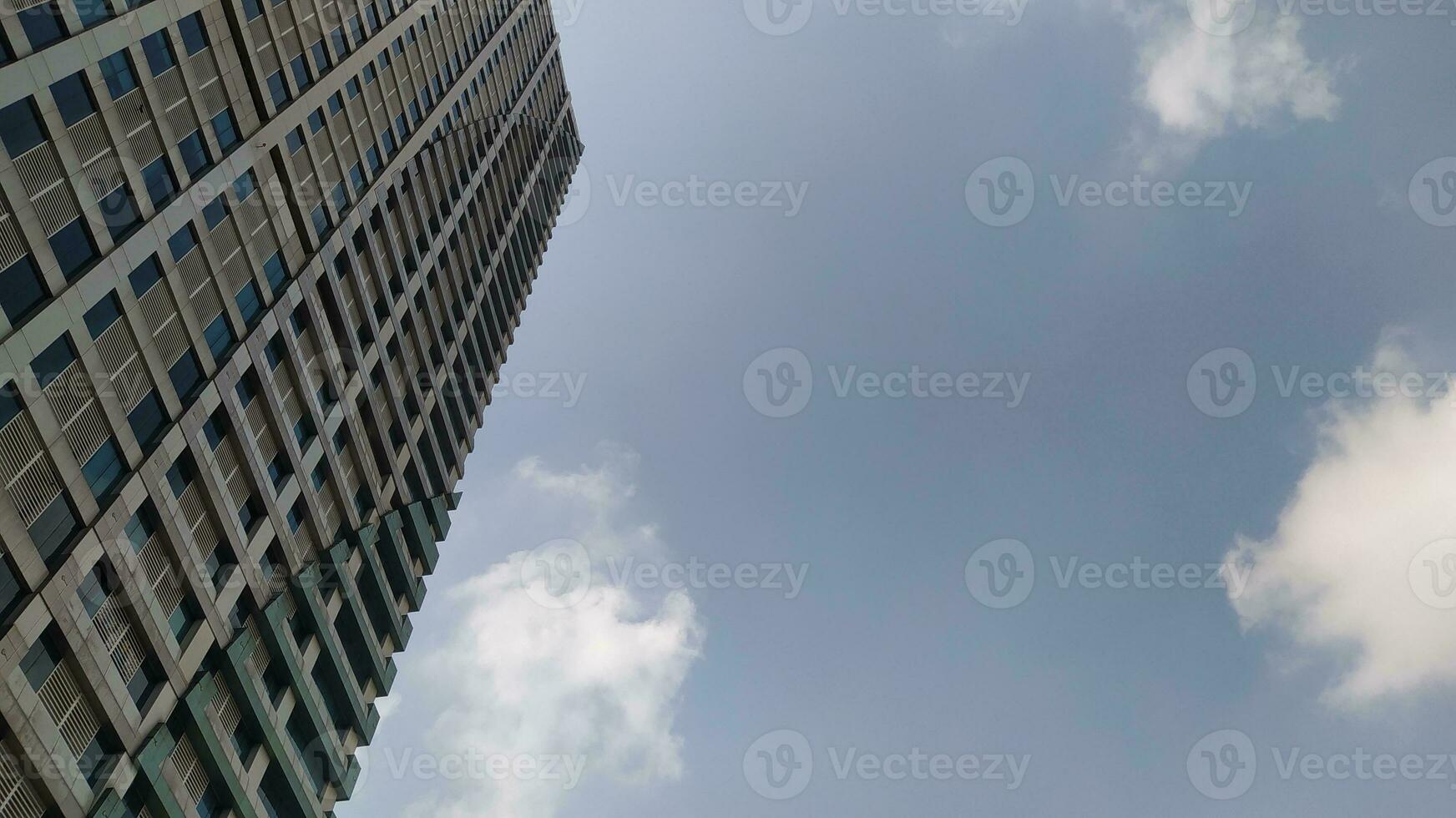 View of tall buildings, seen from the rooftop. photo