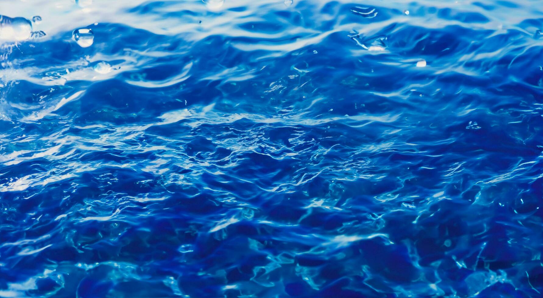 Blue water surface background photo