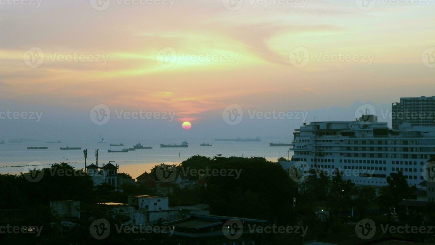 View of the sunset from the top of the building photo