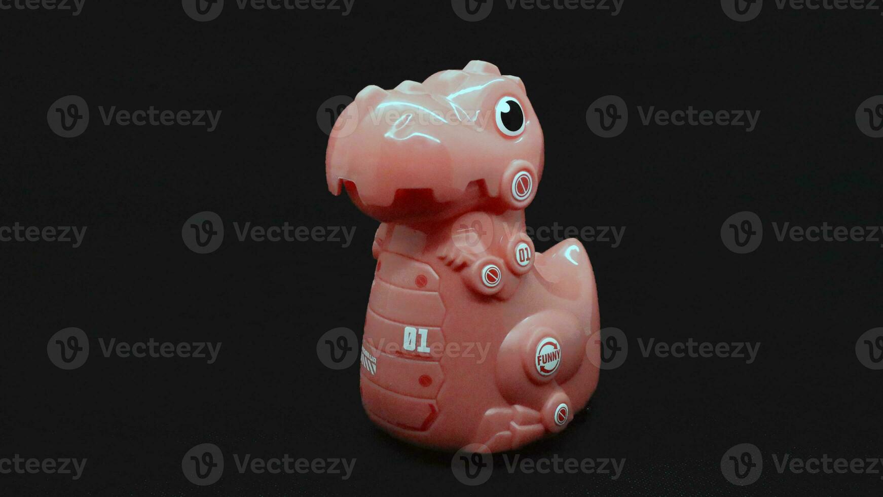 Pink dinosaur toy isolated photo
