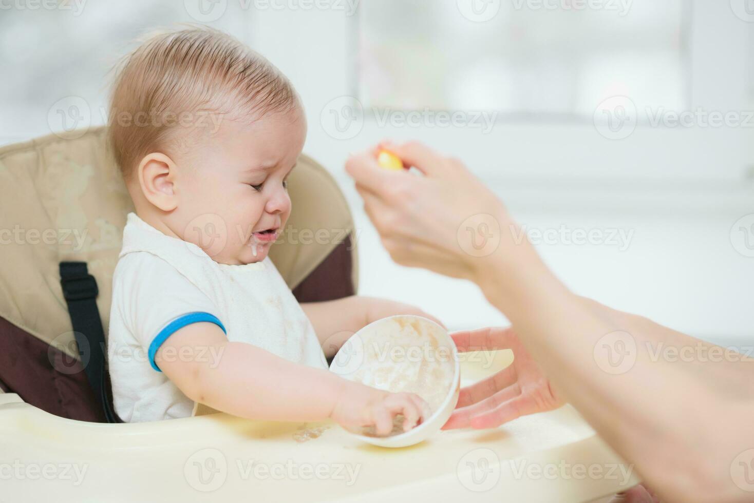 mother feeding her baby breast porridge day photo