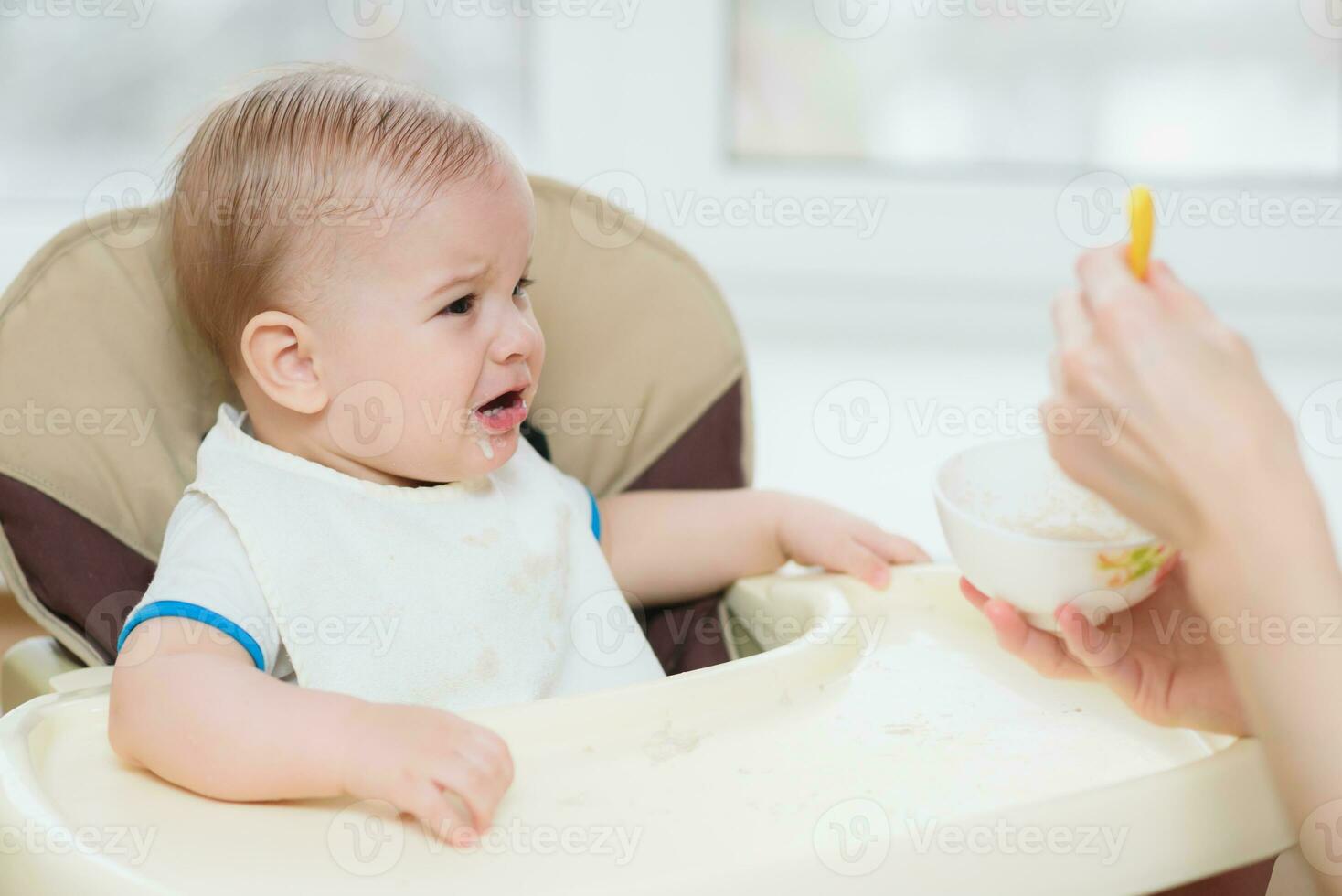 mother feeding her baby breast porridge day photo