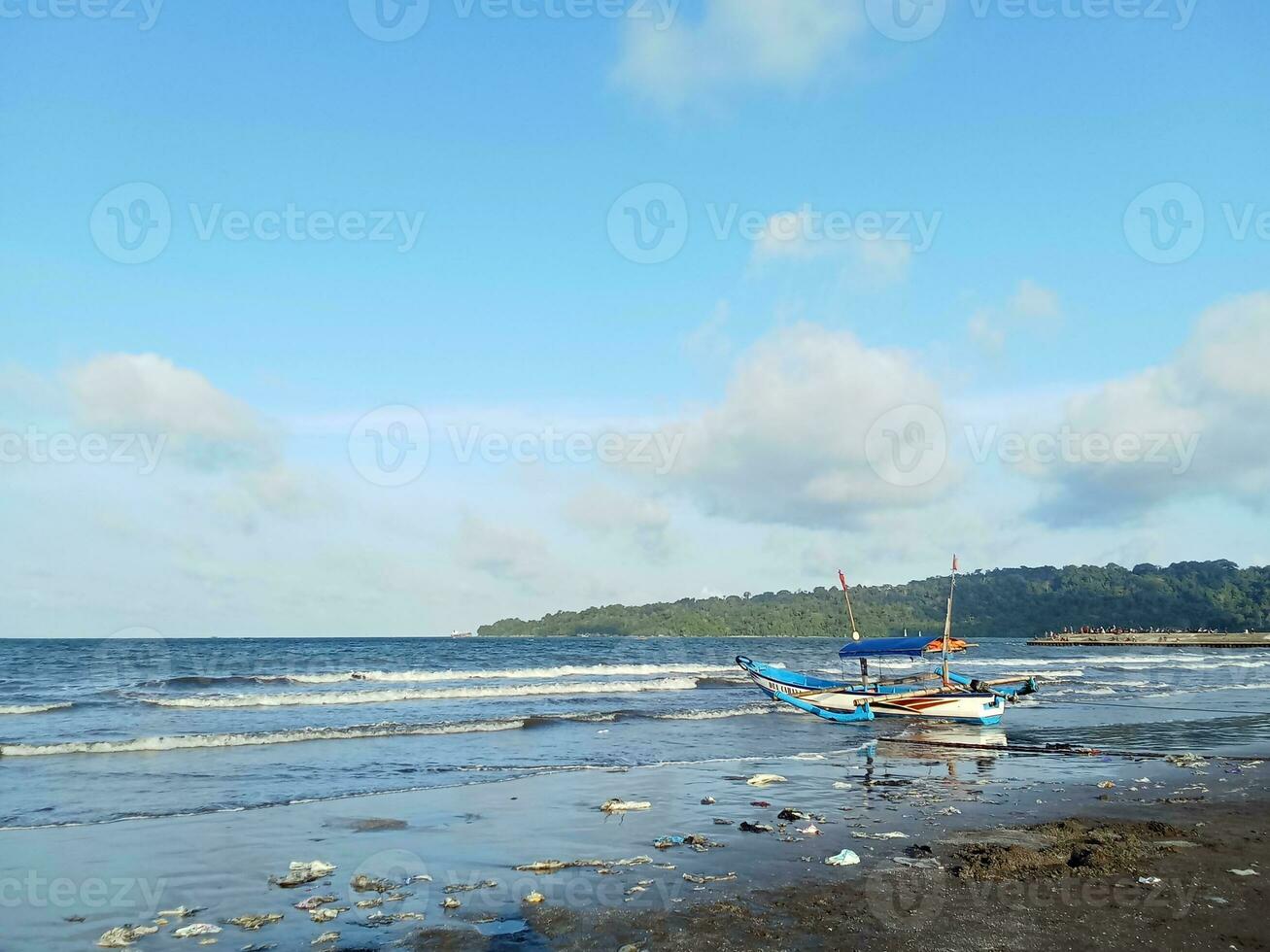 View of fishing boats on the beach photo