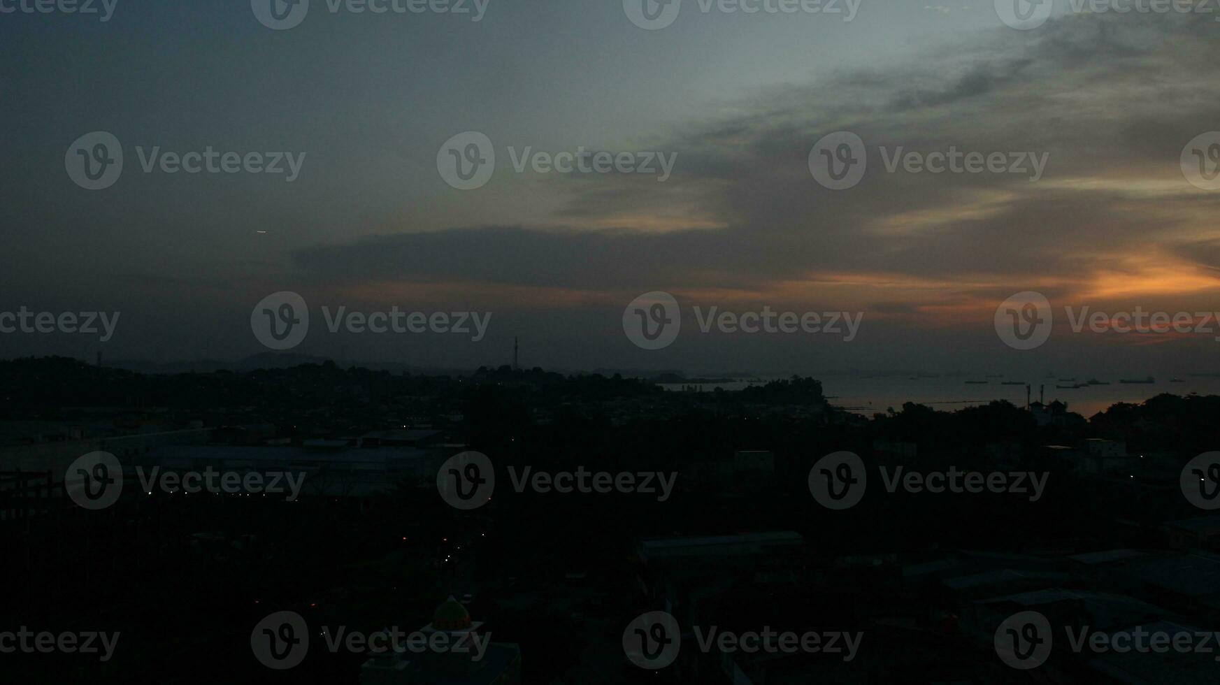 View of the sunset from the top of the building photo