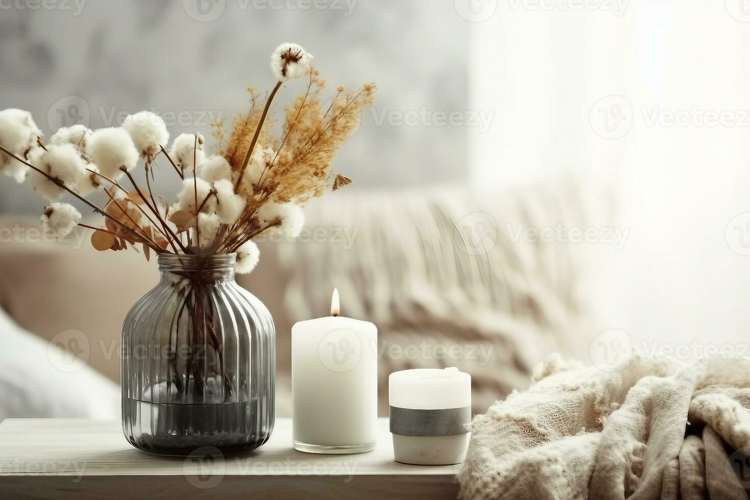 a minimalistic composition in the scandinavian style with dried flowers in a vase and candles.generative ai. photo