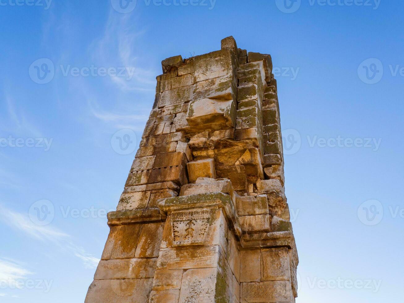 Ruins of a column of a medieval orthodox church photo