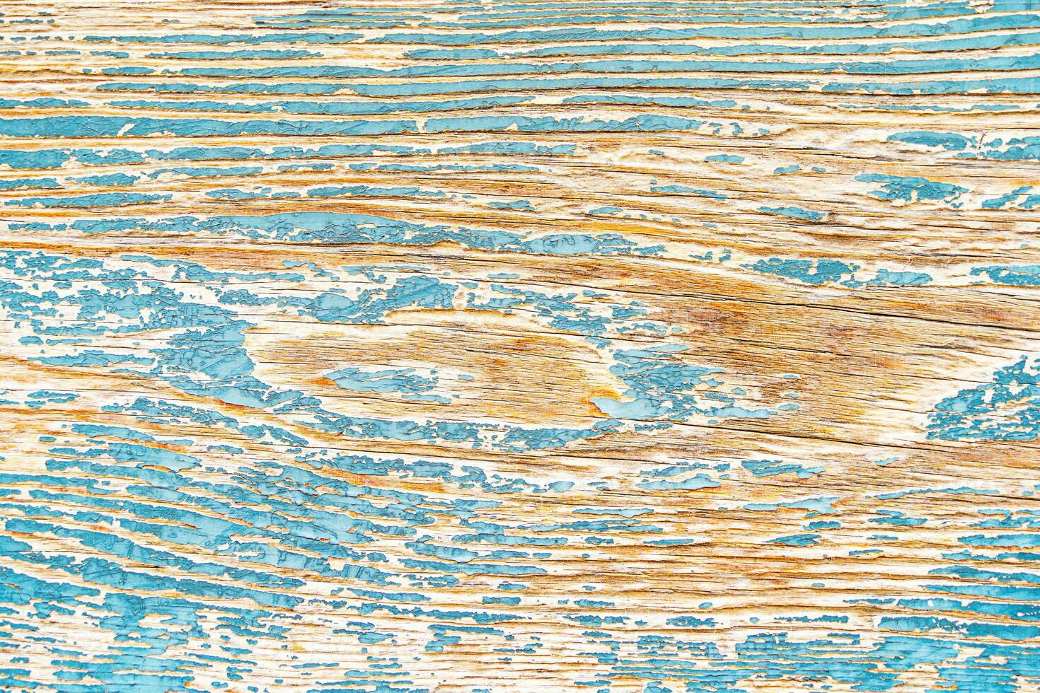 close-up of a wooden panel texture -  Old wooden board background painted in blue photo